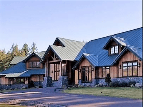 Custom home exterior featuring stone masonry accents
