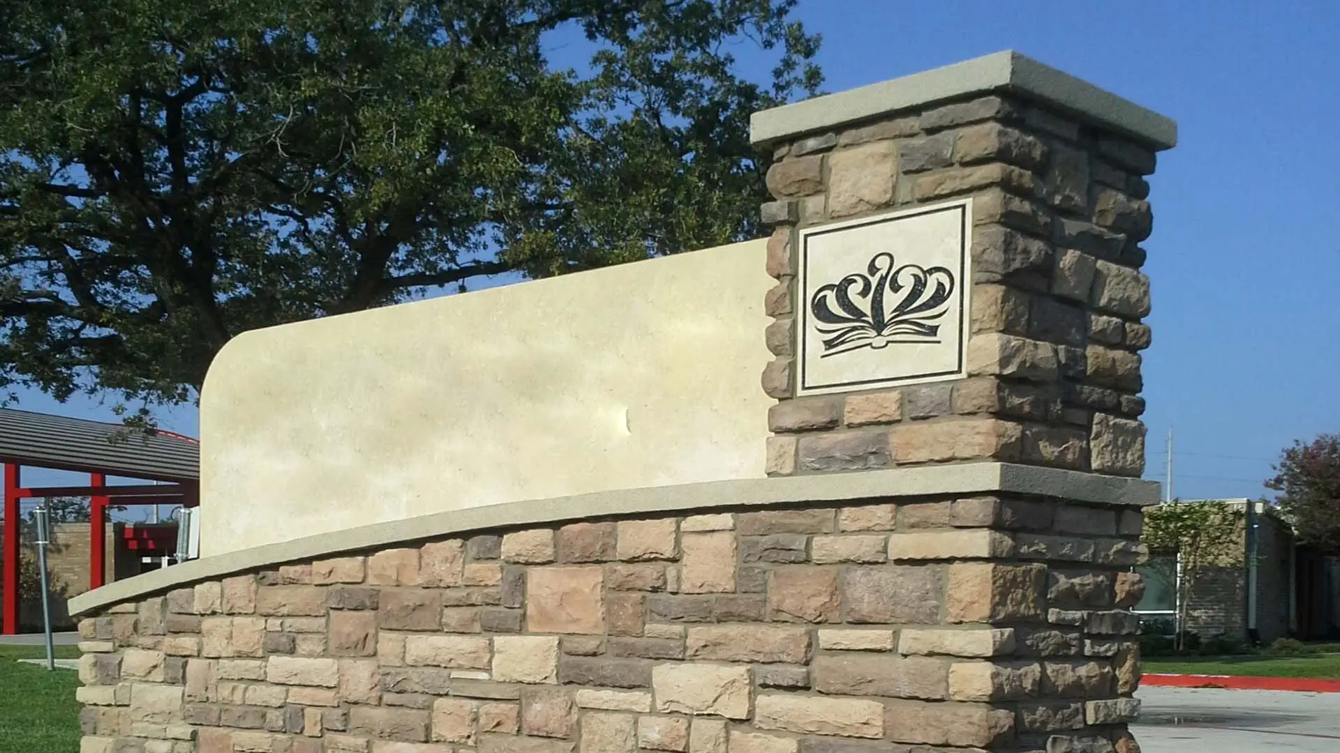 stone and entry and monument sign